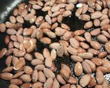 A picture of step 1 of Vinegar and Salt Almonds.