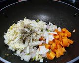 A picture of step 3 of Thai style fried rice with vegetables and tofu.