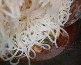 A picture of step 6 of Masala spaghetti.