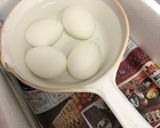 A picture of step 3 of Economizing Boiled Egg.