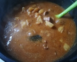 Foto del paso 7 de la receta: Patatas con carne en salsa con picada de frutos secos