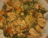 A picture of step 4 of Salmon with courgettes spinach and orange bell pepper.
