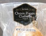 A picture of step 2 of Toasted onion poppy ciabatta bread with goat cheese and pesto.