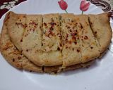 A picture of step 12 of Cheese Garlic Bread.