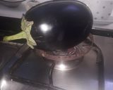 A picture of step 1 of Baingan Bharta.