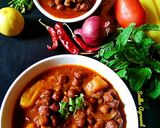 A picture of step 7 of Desi-Style Chana Aloo (Desi-Style Chickpea and Potato Curry).
