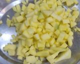 A picture of step 2 of Daki sawal of yesterday rice with fruit ginger, small onion,green chilli and tadka.