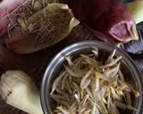 A picture of step 1 of Kadali Fula Bhaja (Banana Flower fry).