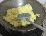 A picture of step 2 of Gajar ka halwa.