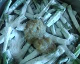 A picture of step 2 of Crispy bhindi.