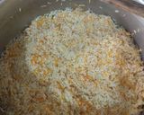 A picture of step 4 of Garlic-carrot rice.