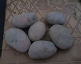 A picture of step 6 of Alo chicken.