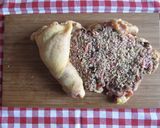 Foto del passaggio 5 della ricetta Rotolo di tacchinella farcita