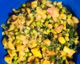 A picture of step 5 of Mooli-Aloo-Matar.