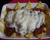 A picture of step 5 of Nachos with Refried Beans and Cheese.
