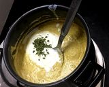 A picture of step 13 of Malai kofta with white gravy curry.