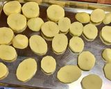 A picture of step 2 of Crispy garlic potato slices.