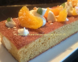 Foto del paso 6 de la receta: Bizcocho de naranja relleno de crema de chocolate blanco y yogur
