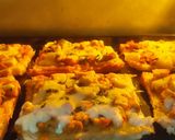 A picture of step 9 of Cheesy Pizza Bread 🍕.