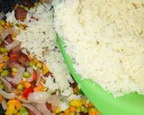 A picture of step 5 of Sausage fried rice.