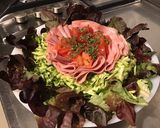 Une image de l'étape 9 de Salade de feuille de chêne aux tomates, courgettes et mortadelle de Bologne.