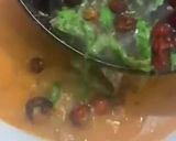 A picture of step 12 of Sweet and sour Tomato Curry serve with white rice.