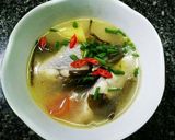 Hình bước làm 3 của món Cá điêu hồng nấu canh dưa cải chua