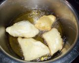 A picture of step 9 of Carrot milk mandazi#my creative soft mandazi recipe contest.