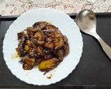 A picture of step 3 of Masala Brinjal with sesame seeds.