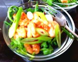 A picture of step 4 of My Garlic & Sweet Chilli prawns on a Wild Rocket bed 🤗.