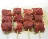 A picture of step 3 of Beef-Wrapped Green Onion Skewers.