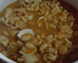 Foto del paso 12 de la receta: Alubias con calamares y almejas