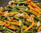 A picture of step 4 of Schewan beans and carrot stir fry.