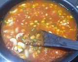 A picture of step 6 of Tomato Macaroni Soup.
