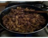 A picture of step 5 of AMIEs Eggplants Stuffed with Sausage.