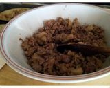 A picture of step 7 of AMIEs Eggplants Stuffed with Sausage.