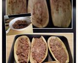 A picture of step 8 of AMIEs Eggplants Stuffed with Sausage.