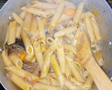 A picture of step 5 of Penne Jollof.