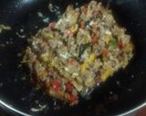 Foto del paso 4 de la receta: Zucchini relleno de carne, aceitunas negras y pimientos al gratín