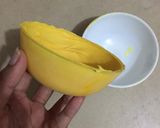 A picture of step 1 of Ice cream with fruits in chocolate bowl.