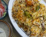 A picture of step 8 of Chicken malai biryani.