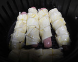 Foto del paso 4 de la receta: Salchichas con hojaldre en freidora de aire