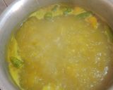 A picture of step 2 of Beef haleem with boil rice.