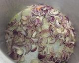 A picture of step 1 of Ghee Coconut Rice.