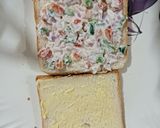 A picture of step 2 of Vegetable cheese spread Sandwich.