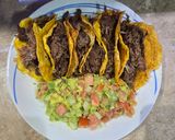 Foto del paso 4 de la receta: Mini tacos de deshebrada preparada