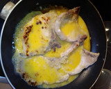 Foto del paso 3 de la receta: Chuletas de lomo en salsa de naranja