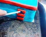 A picture of step 5 of Kitchen Themed Cake.