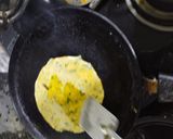 A picture of step 3 of Methi Thepla with boondi Raita and Sweet Mango pickle.