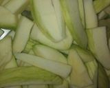 A picture of step 1 of Kachche aam ka Gudamba.